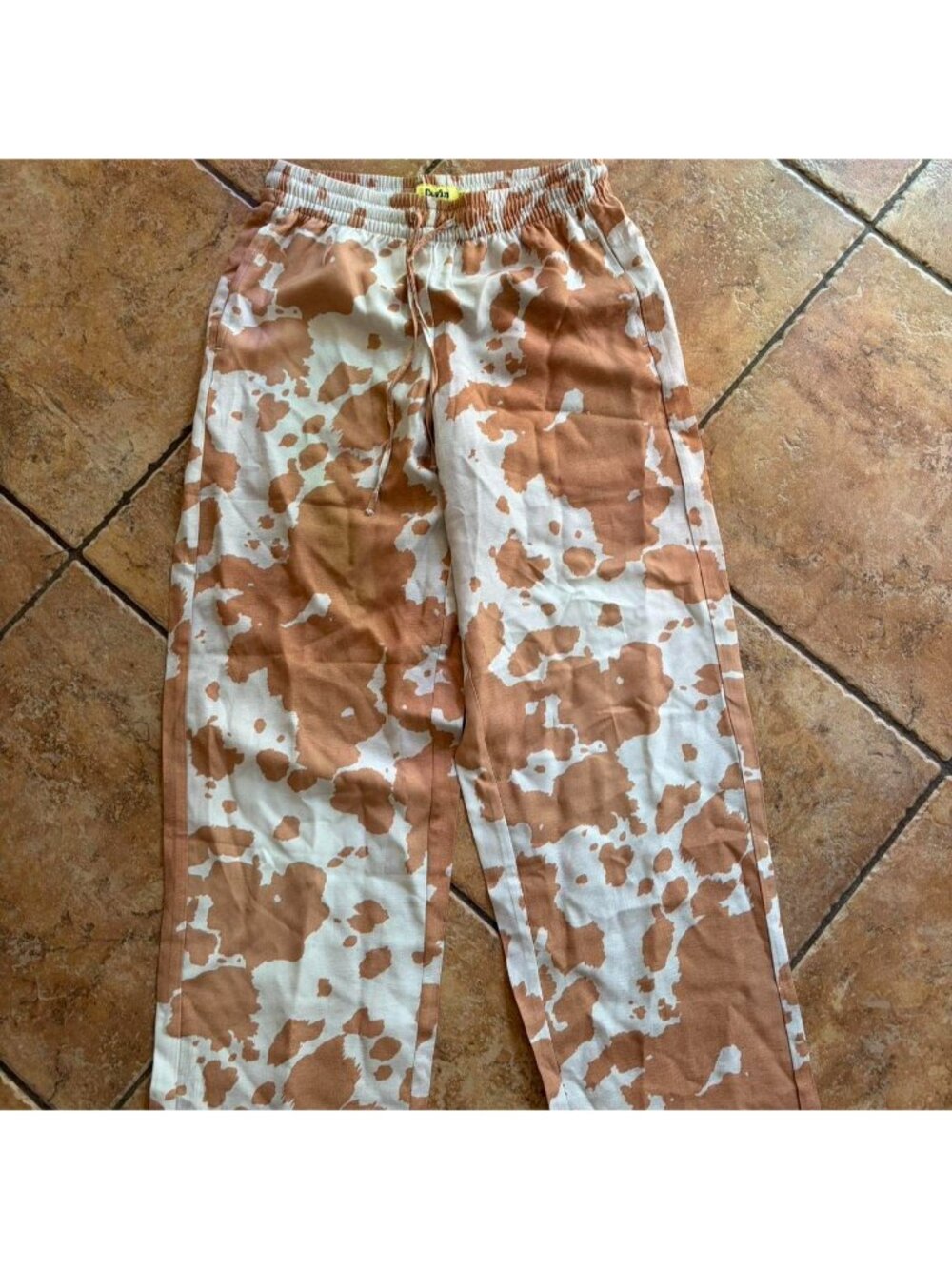 Duvin brown and white cow print pants in XS